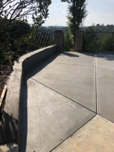 Concrete driveway extension with control joints