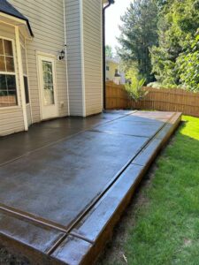 Newly stained concrete patio in Atlanta by Sam The Concrete Man